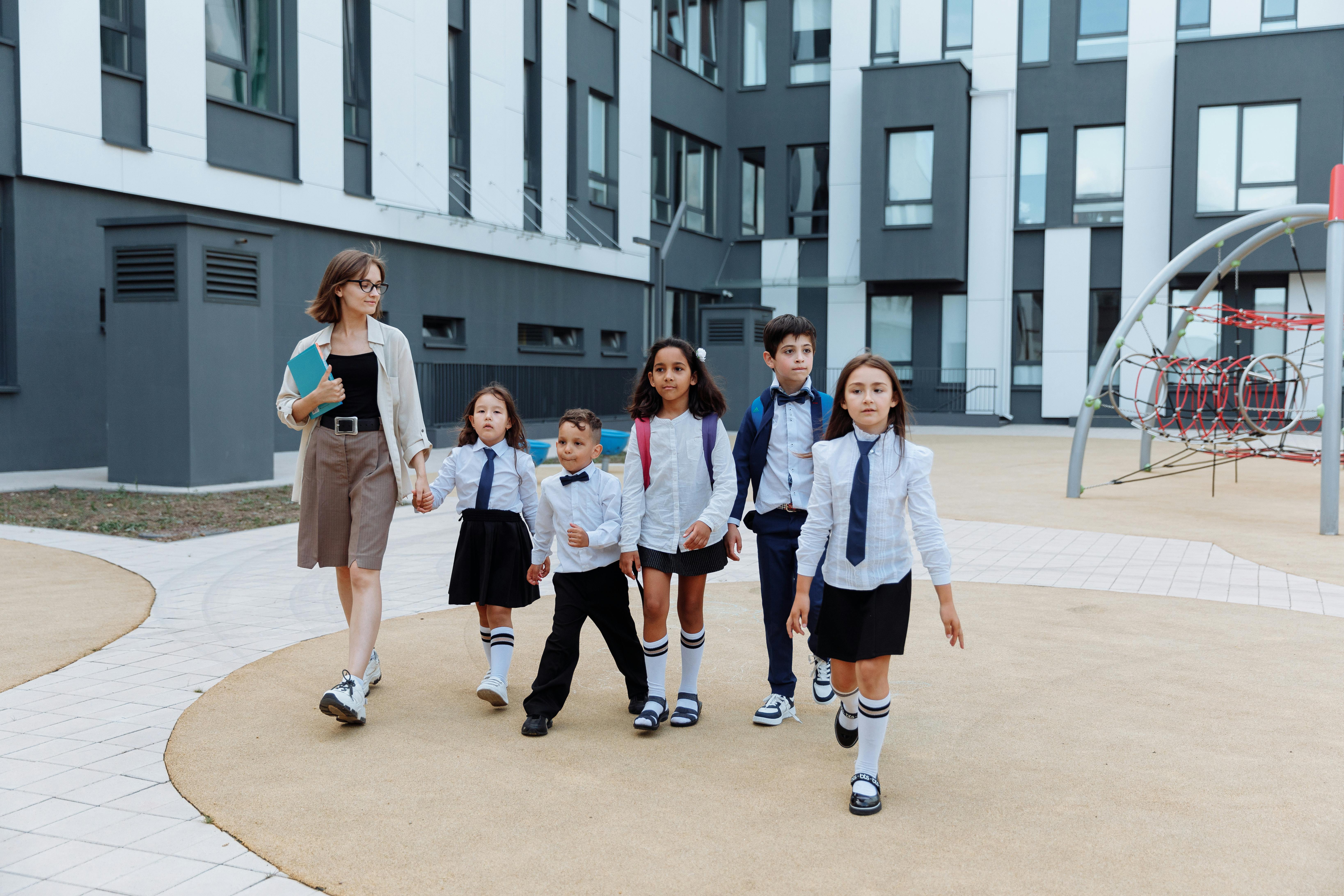 primary school children with teacher